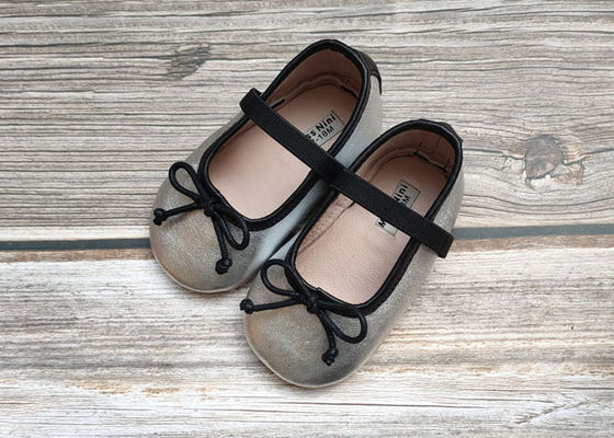 Zapatos suaves de los niños de la zalea
